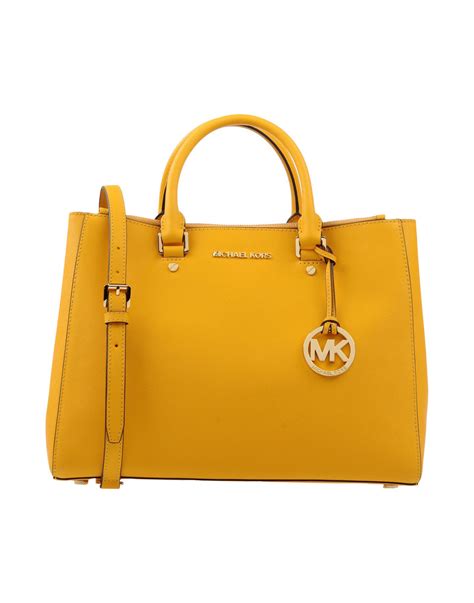 yellow michael kors purse